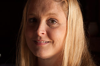 Portrait of a young woman taken inside a railroad car